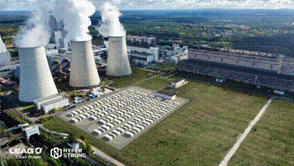 A factory with smoke coming out of the chimneyAI-generated content may be incorrect.